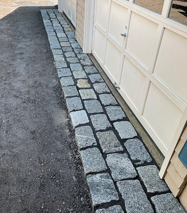 Granite rock border to garage