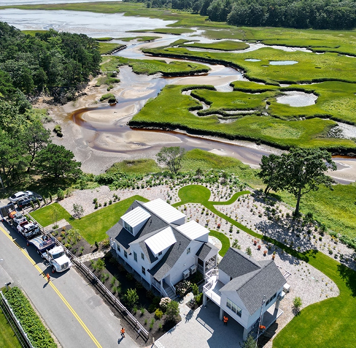 View of house in Maine near the ocean with a beautiful driveway