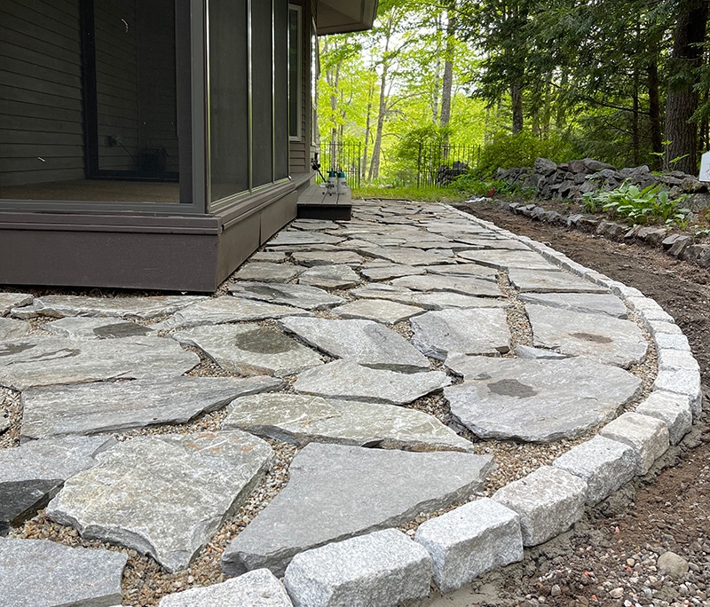 Natural rock pathway around the house